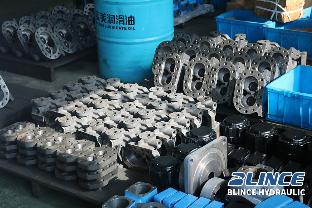 hydraulic pump and motor parts in workshop for oil cleanliness and replacement inspection