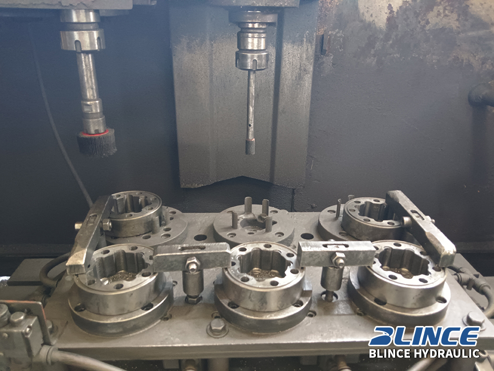 Precision machining of hydraulic gear motor internal parts shows controlled production for reliable motor performance.