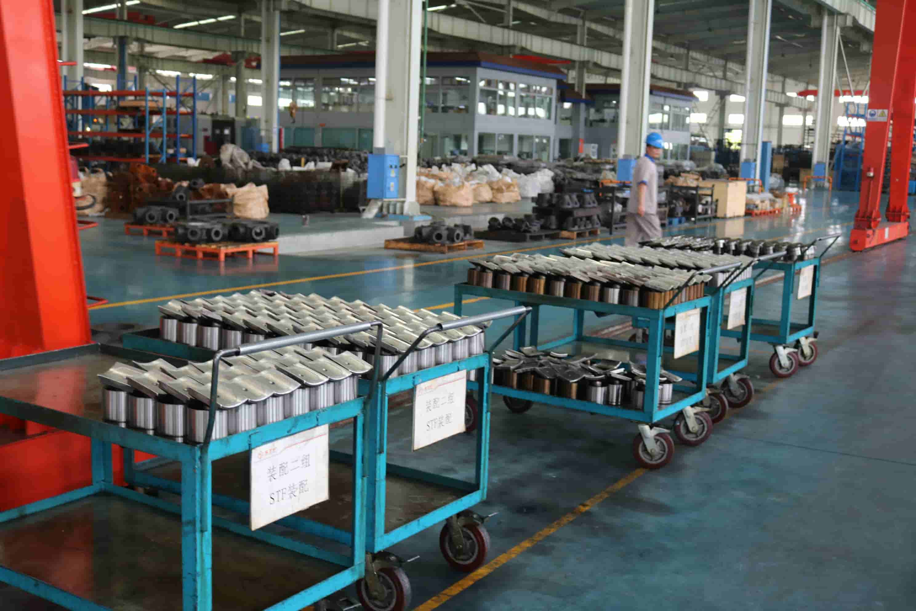 Blince hydraulic motor rotor and stator components organized in the factory workshop