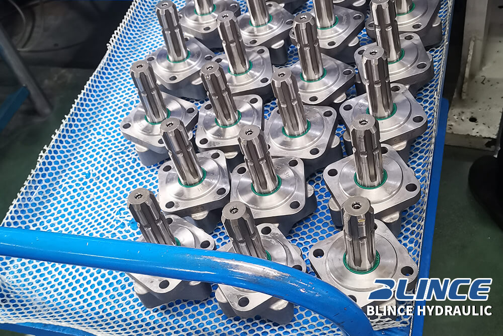 splined hydraulic motor shafts prepared for replacement and coupling engagement inspection